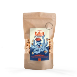 Knalle Popkorn: Auf dem Bild ist eine braunen wiederverschließbarer Beutel sichtbar. Auf dem Etikett sieht man einen lustigen blauen Kranken mit Schnurrbart und roter Baskenmütze. Am Ende der Tentakeln hält der Krake Franzbrötchen