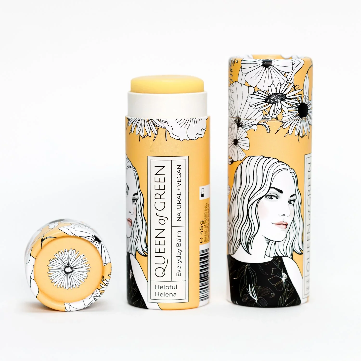 Kopf- bis -Fuß Pflege-Stift - Helpful Helena 1 Körperbalsam Pflege im Stickform „helpful Helena“ von Queen of Green in gelber, floral gestalteter Verpackung aus recyceltem Karton teilweise geöffnet mit sichtbar gelbem Balm; natürliche, vegane Körperpflege im Stick.